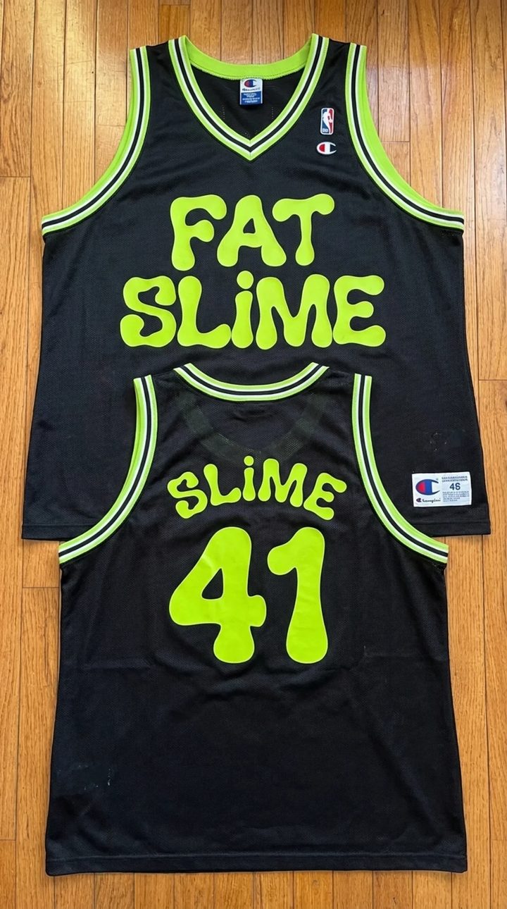 the fat slime #41 jersey laid flat: black mesh with slime green trim, FAT SLIME on the front and SLIME 41 on the back